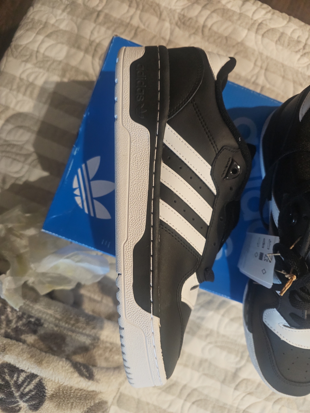 Adidas Black and White Low-Top Sneakers with Three Stripes